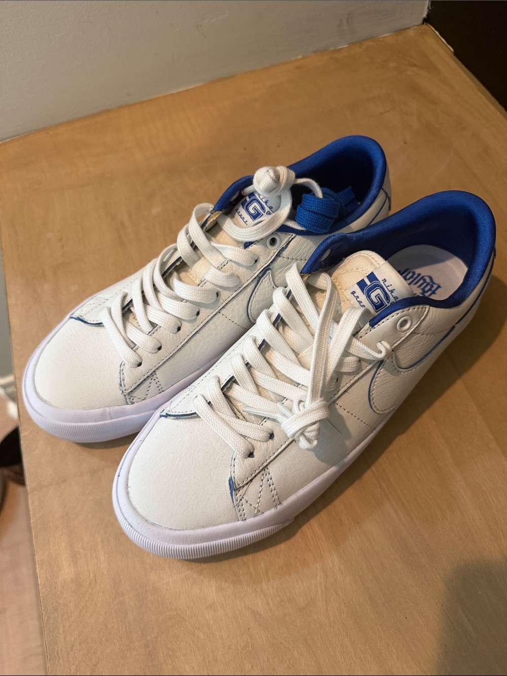 Nike White Low-Top Sneakers with Blue Lining